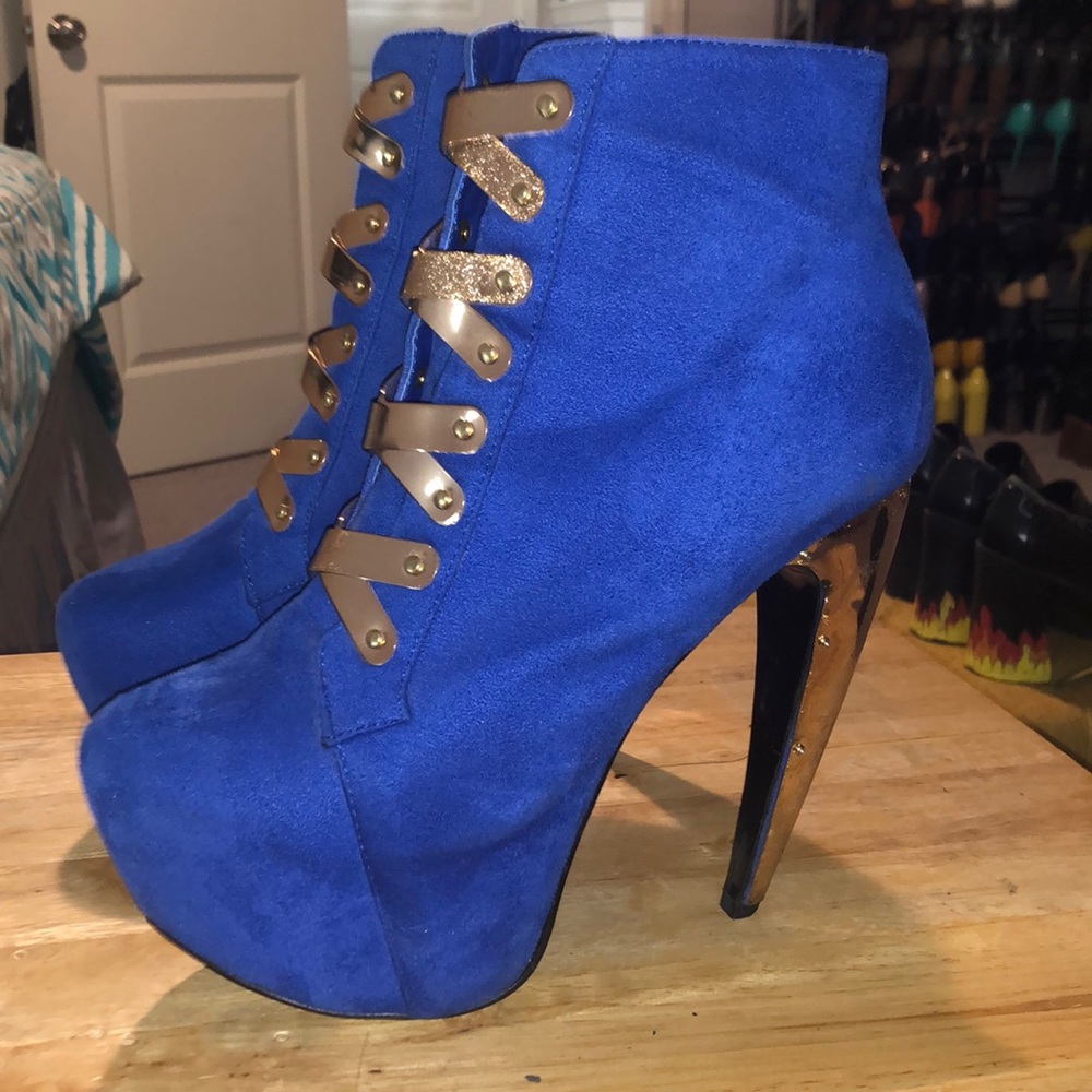Privileged Blue sued boots
